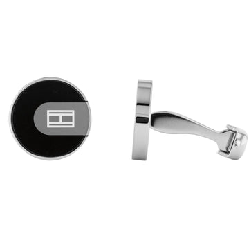 Ανδρικά μανικετόκουμπα Tommy Hilfiger σε ασημένιο χρώμα στρογγυλό σχήμα και μαύρο σμάλτο κατασκευασμένα από χειρουργικό ατσάλι.